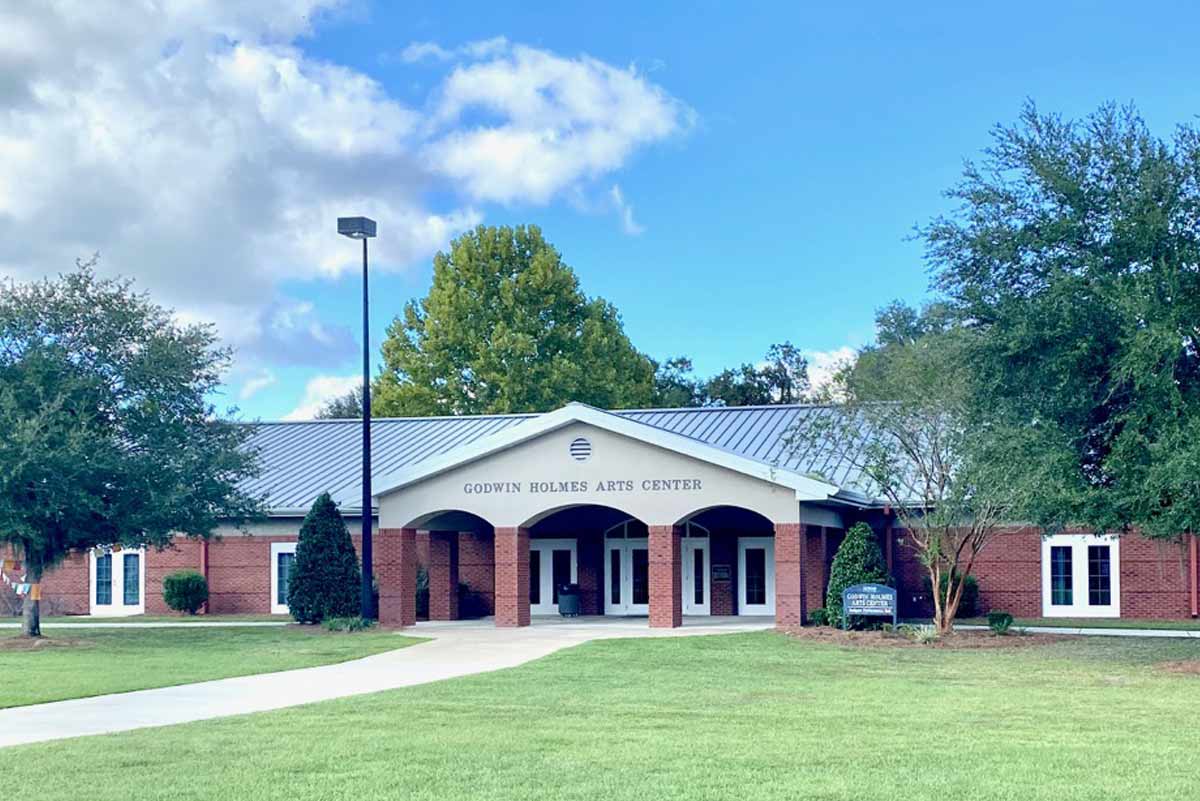 This school is a traditional designed 17,676 sq. ft. metal building with brick walls, front entry arches and a metal roof.
