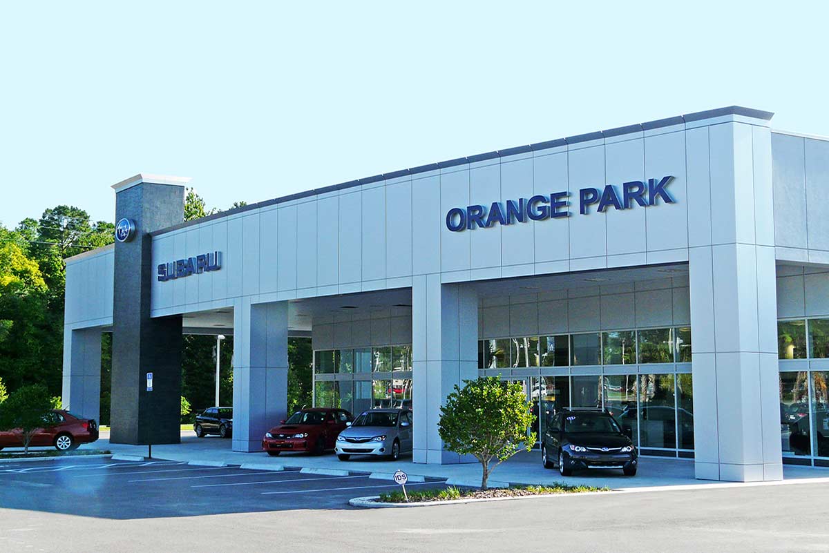 Hanania Subaru’s modern metal building design features wall of windows displaying new and used cars in Jacksonville, Florida. Hanania Subaru’s modern metal building design features wall of windows displaying new and used cars in Jacksonville, Florida.
